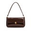 Elva Shoulder Bag with a glossy finish, decorative gold-tone clasp, front flap closure, and shoulder strap.