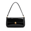 Elva Shoulder Bag with a glossy finish, decorative gold-tone clasp, front flap closure, and shoulder strap.