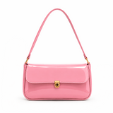Shop the Elva Shoulder Bag by Bagcio. Discover an elegant women's shoulder bag with a glossy finish, gold-tone hardware, and a stylish front flap design.
