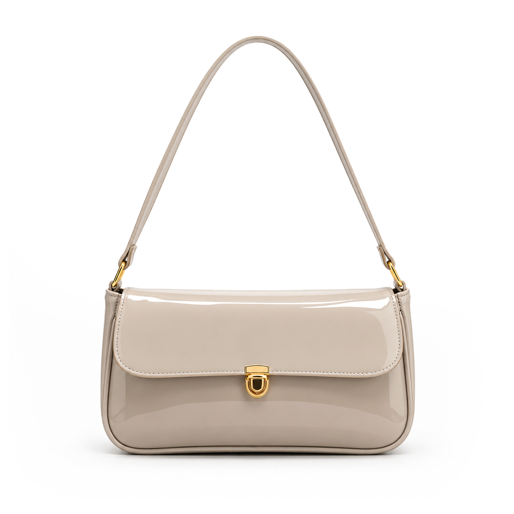 Elva Shoulder Bag with a glossy finish, decorative gold-tone clasp, front flap closure, and shoulder strap.