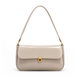 Elva Shoulder Bag with a glossy finish, decorative gold-tone clasp, front flap closure, and shoulder strap.