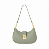 Front view of a sage green half moon shoulder bag with gold-tone chain links and a turn-lock clasp on a white background.
