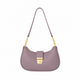 Front view of a mauve half moon shoulder bag with gold-tone chain links and a turn-lock clasp on a white background.